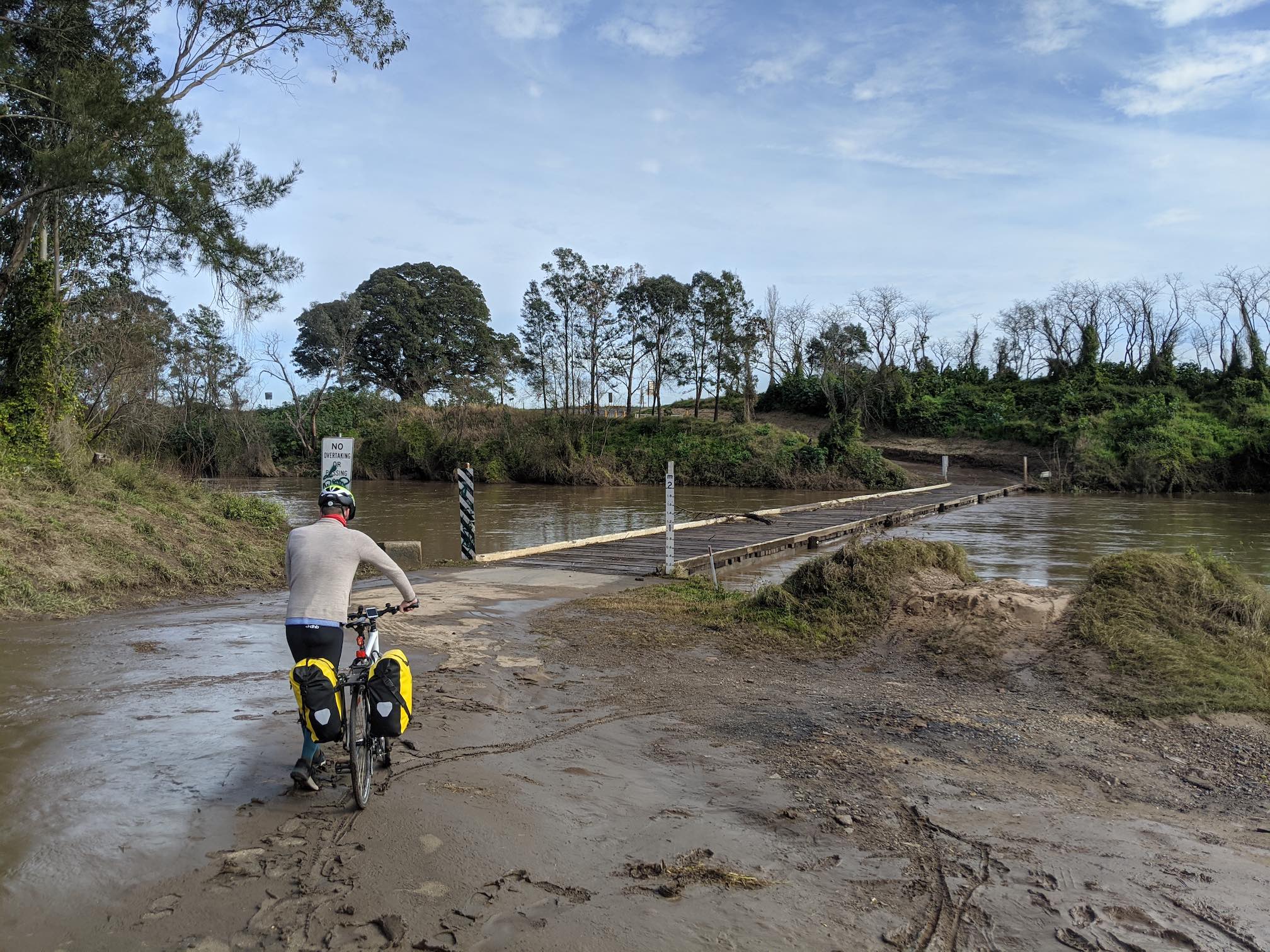 Wooden, low bridge, with lots of mud on approach.