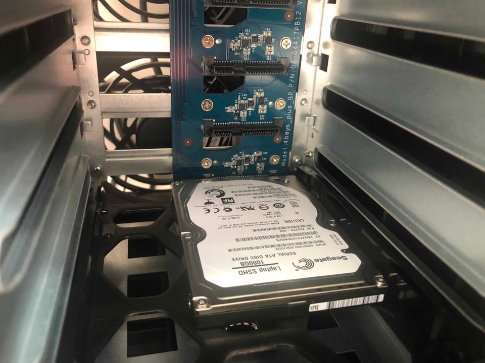 One Hard Drive in a 4-bay Synology Network Attached Storage case.